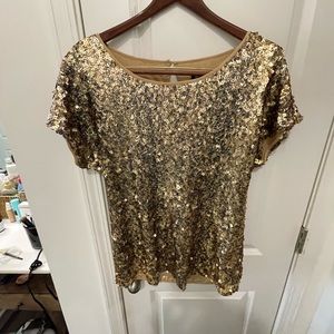 Gold glitter top looks great with jeans